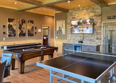 brunswick ping pong and reno pool table in cabin game room