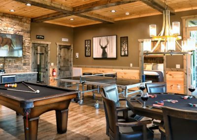 rustic game table, reno pool table, and brunswick ping pong table in a Smoky Mountain cabin