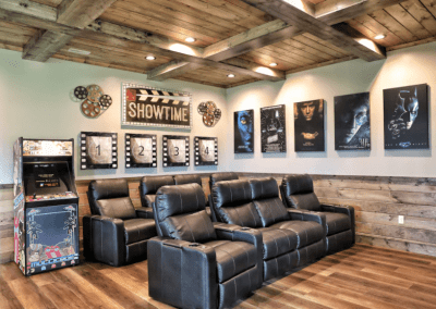 theater seats and multicade machine in a theater room of a Smoky Mountain cabin